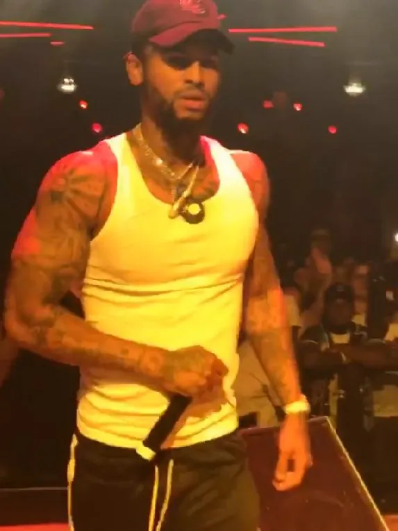 Dave East performing on stage