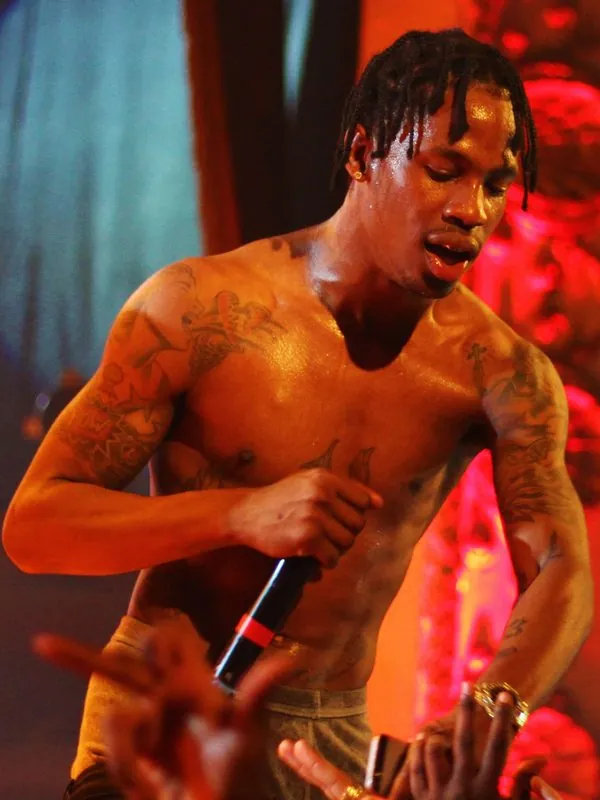 Travis Scott performing on stage
